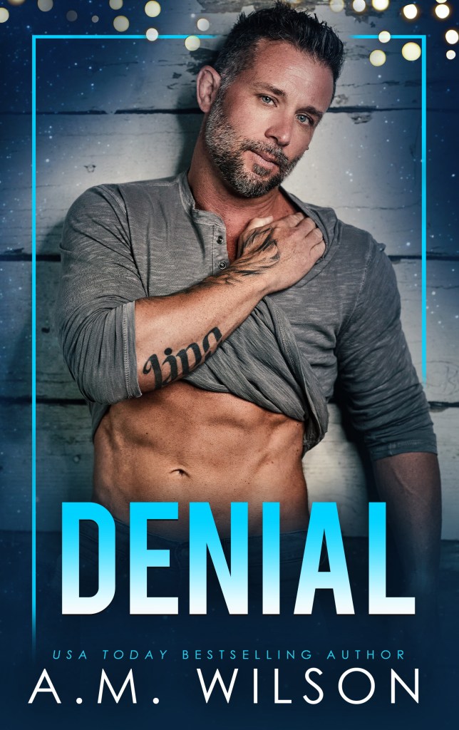 Book cover model wearing a gray long sleeved shirt pulled up to show his abs. The title is in a light blue ombre